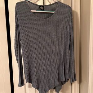 Long sleeve shirt. Not sure of the exact color. Cross between blue/gray